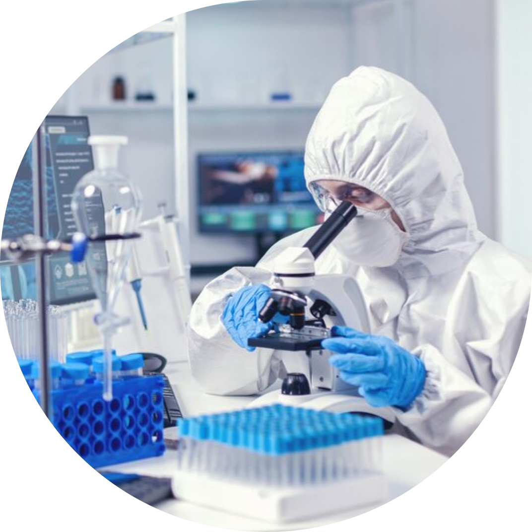 Cleanroom operator using a microscope
